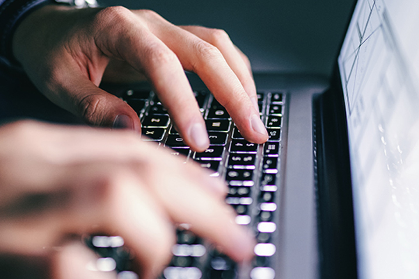 Discoverorg Portrait 1 Hands typing on laptop