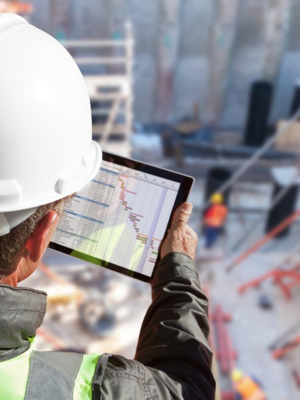 Builder looking at tablet