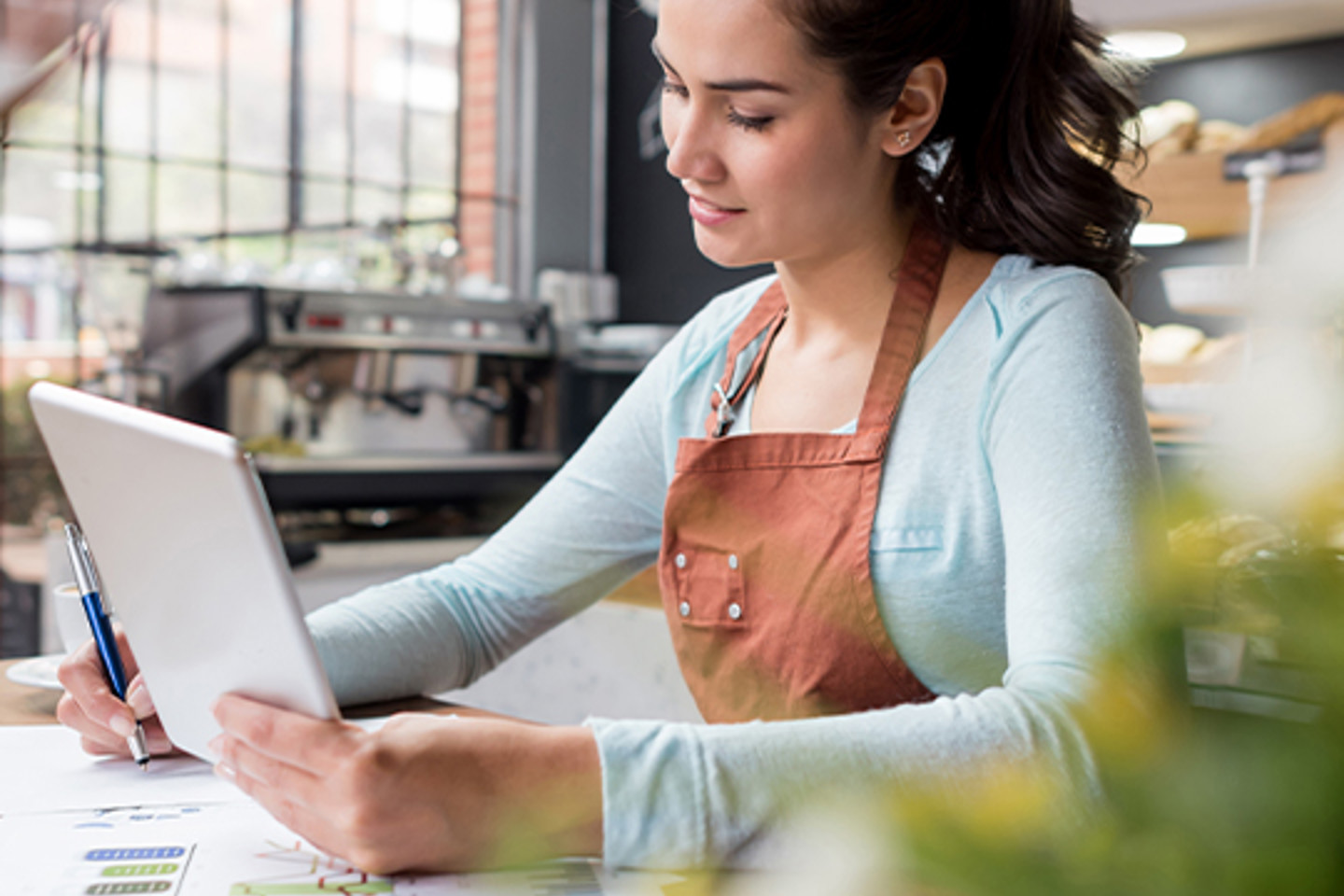 Corcentric Portrait 1 woman working on tablet