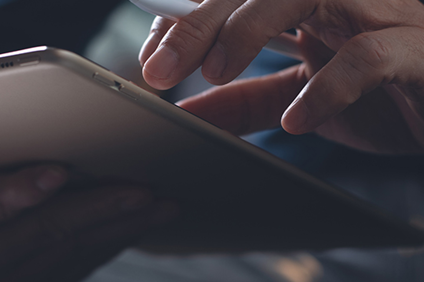 Orangelogic Portrait 2 hand working on tablet